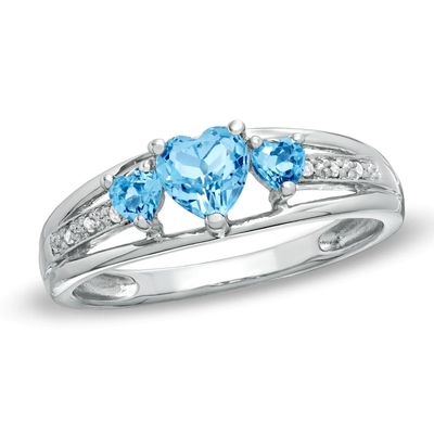 O coração deu forma ao topázio azul e ao ouro branco do anel 10K de Diamond Accent Three Stone Promise